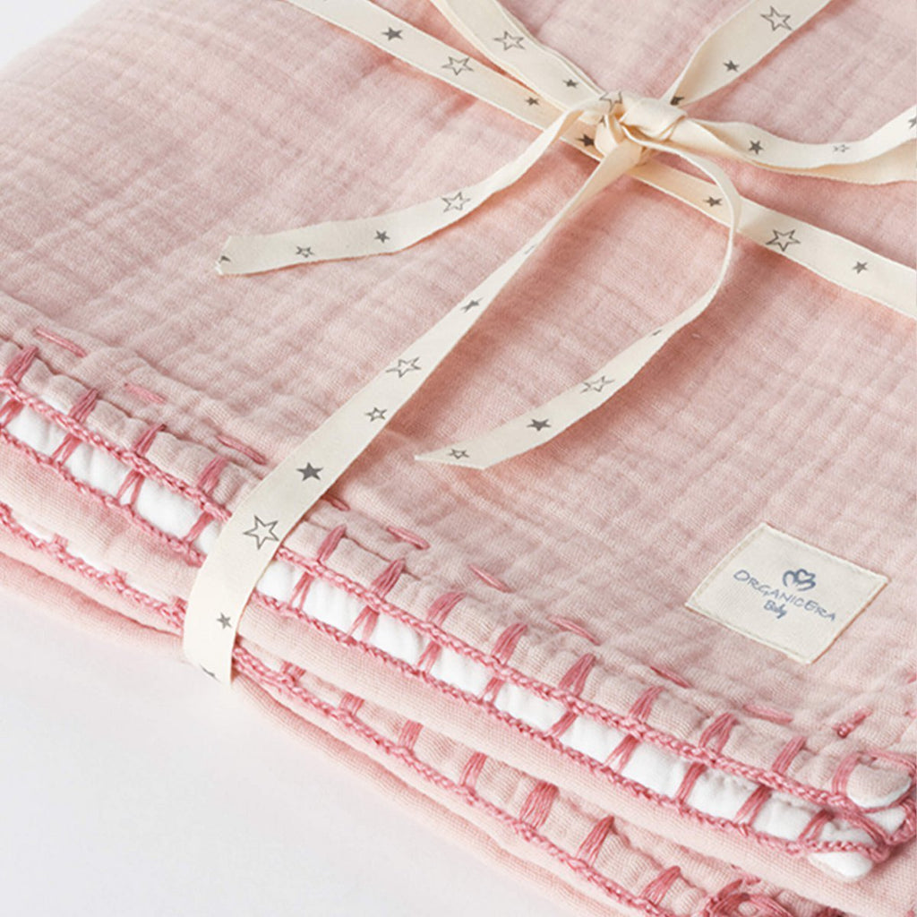 Couverture bébé en mousseline bio à paillettes – Rose poudré